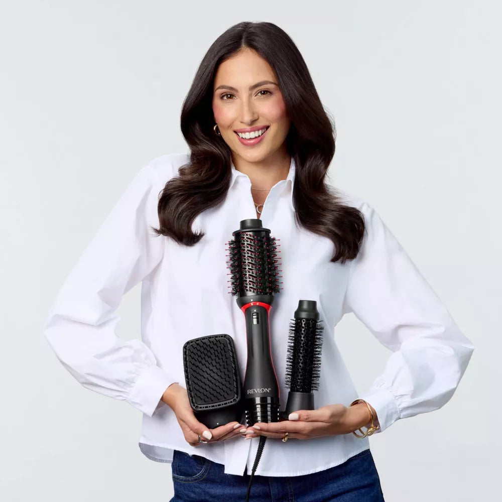Woman holding a hair styling tool set